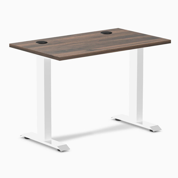 Desky Zero Mini fixed-height desk with Jarrah Legno top, white legs, and two grommets.