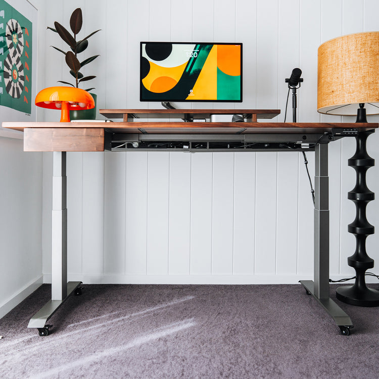 Desky hardwood standing desk with cable and power channels