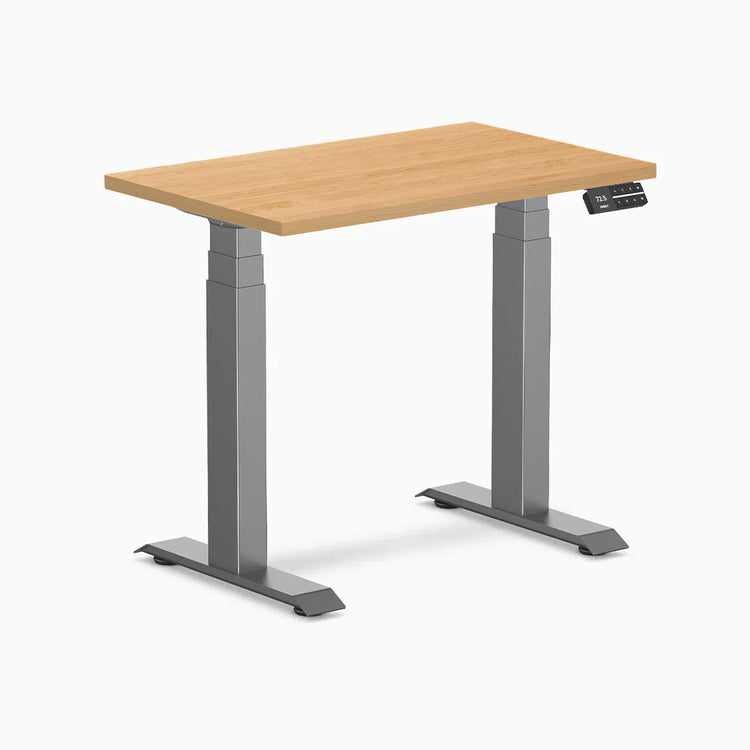 Desky Dual Mini Hardwood Sit Stand Desk with maple top and space gray frame.