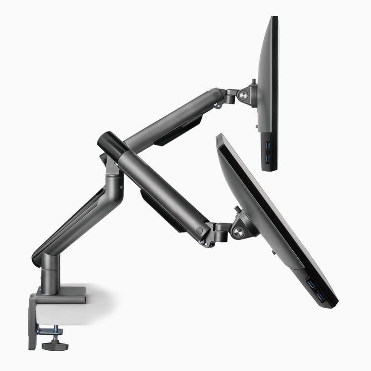 Desky Dual Slim Aluminium Monitor Arm attached to two monitors
