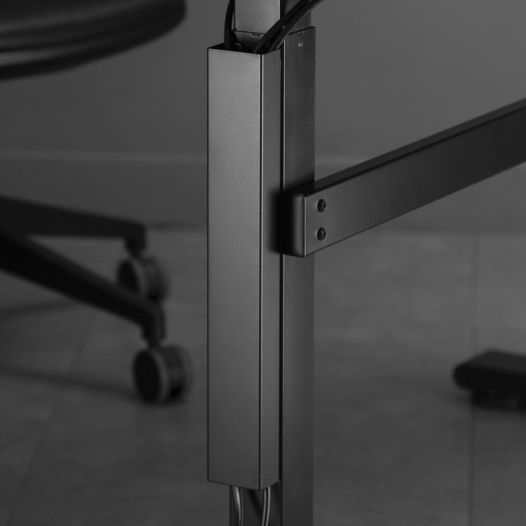 Desky single magnetic cable management in black attached on leg