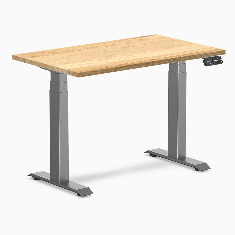 Desky Dual Mini Hardwood Sit Stand Desk with a White Oak top and Space Gray frame.