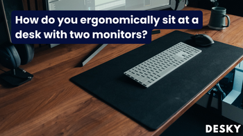 How do you ergonomically sit at a desk with two monitors?
