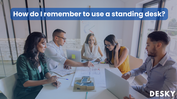 How do I remember to use a standing desk?