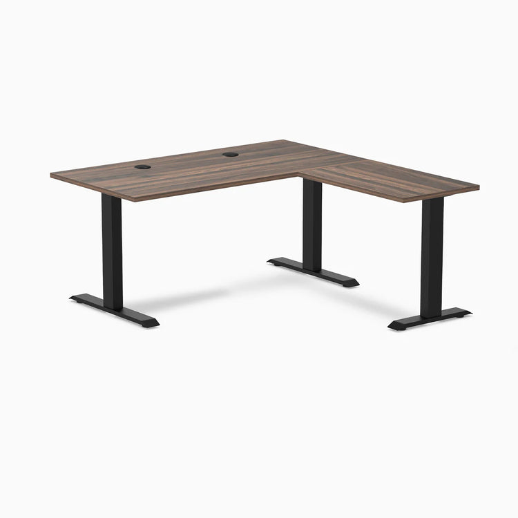 Desky Zero L-shape office desk with Jarrah Legno laminate top, Matte Black steel frame, and grommets.