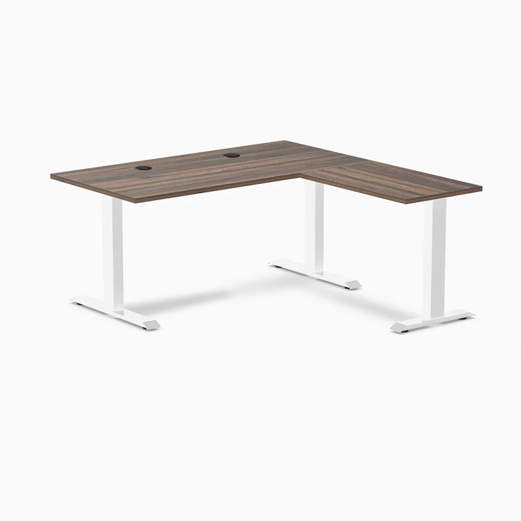 Desky Zero L-shape office desk with Jarrah Legno laminate top, white steel frame, and grommets.