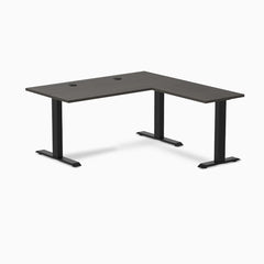 Burnished Wood L-shape office desk with matte black steel frame and grommets.