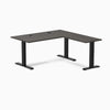 Burnished Wood L-shape office desk with matte black steel frame and grommets.