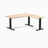 Classic Oak L-shape office desk with a laminate top, black steel frame, and grommets.