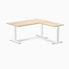 Classic Oak Desky Zero Laminate L-shape office desk with white steel frame and grommets.