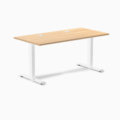 Desky Zero fixed height office desk with Sublime Teak laminate top, white steel frame, and two grommets.