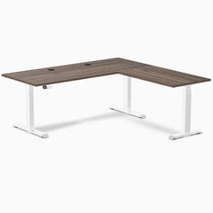 Desky L-Shape Laminate Sit Stand Desk in Jarrah Legno with white legs and grommets.