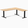 Sublime Teak L-shape office desk with matte black steel frame and grommets.