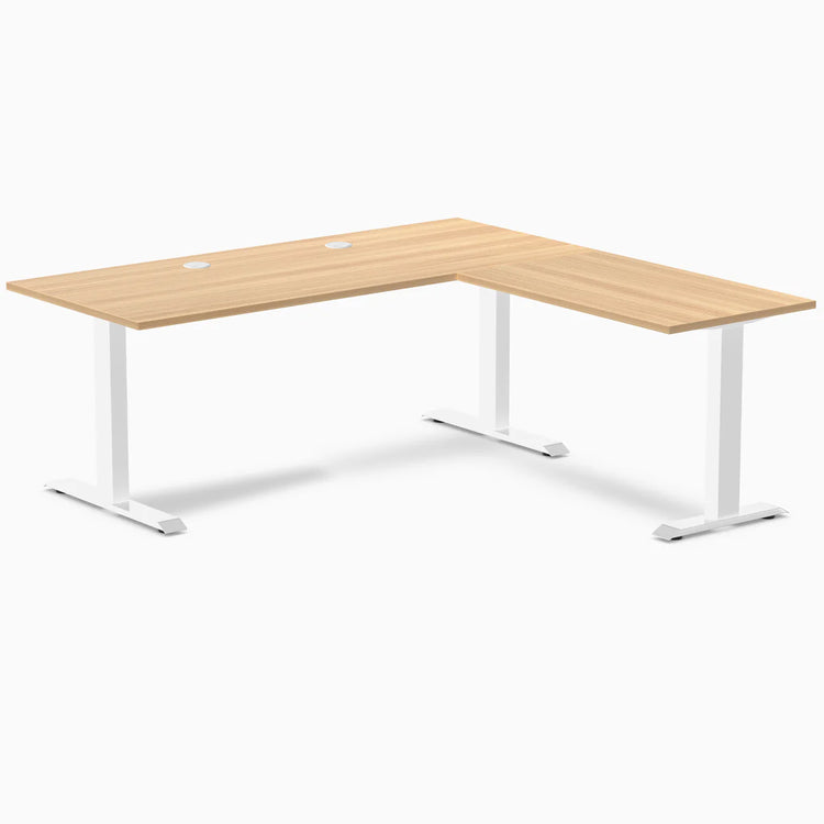 Sublime Teak laminate L-shape office desk with white steel frame and grommets.