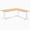 Sublime Teak laminate L-shape office desk with white steel frame and grommets.