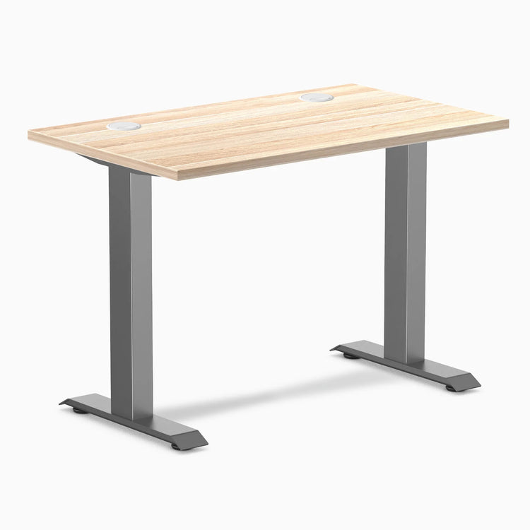 Desky Zero Mini office desk with classic oak 40x24 inch top, grommets, and space gray fixed-height legs.