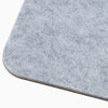 Light gray Desky cork felt desk pad close up on texture