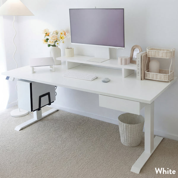 White Desky Dual Laminate Sit Stand Desk with monitor, keyboard, and accessories in a bright office.