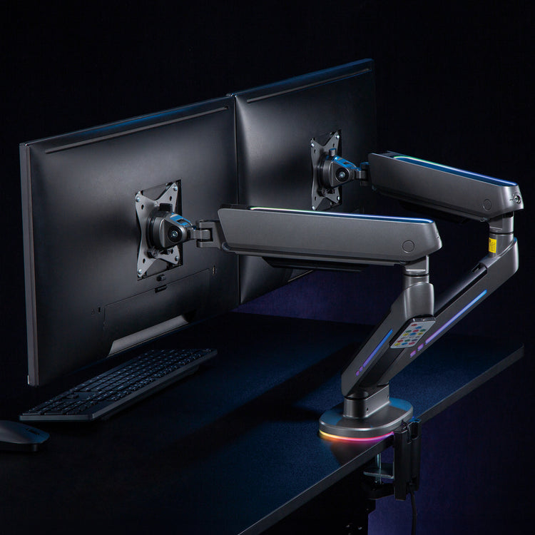 Dual LED monitor arm in black on desk