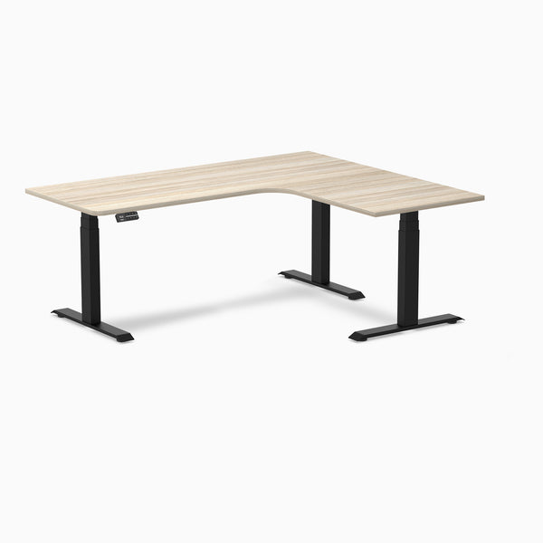 Desky L-Shape Curved Laminate Sit Stand Desk, Classic Oak desktop, Matte Black frame