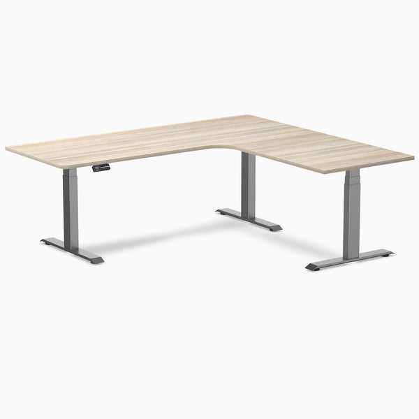 Desky L-Shape Curved Laminate Sit Stand Desk, Classic Oak desktop, Space Gray frame