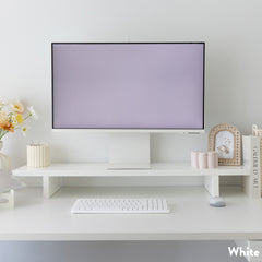 White Desky Minimal Monitor Stand made of melamine, elevating a monitor on a clean, organized desk.