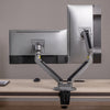 Dual LED monitor arm in space gray with vertical and horizontal monitors