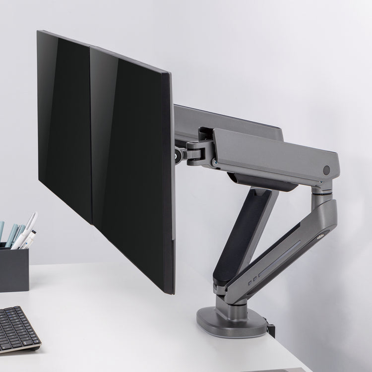 Dual LED monitor arm in space gray with dual monitor