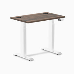 Desky Dual Mini sit-stand desk with Jarrah Legno top, white legs, 32x20 inches, and grommets.