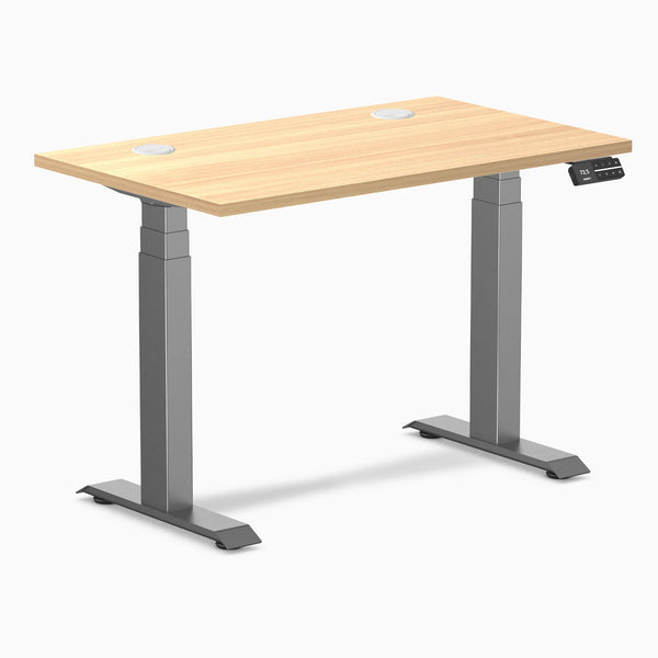Desky Dual Mini sit-stand desk, Sublime Teak 40x24 inch top with grommets, Space Gray frame.