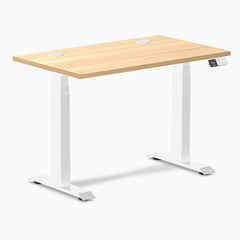 Desky Dual Mini sit-stand desk with a Sublime Teak 40x24 inch top, white frame, and grommets.