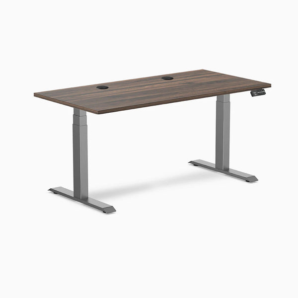 Desky Dual Laminate Sit Stand Desk with Jarrah Legno top, Space Gray legs, and two grommets.