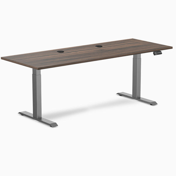 Desky Dual Laminate Sit Stand Desk with Jarrah Legno top, Space Gray legs, 78.7x29.5 inches, and grommets.