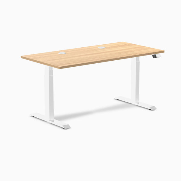 Desky Dual sit-stand desk with Sublime Teak laminate top, white frame, and two grommets.