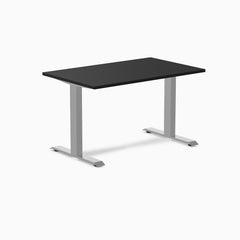 Desky Zero fixed height office desk with a black laminate top and silver steel frame.