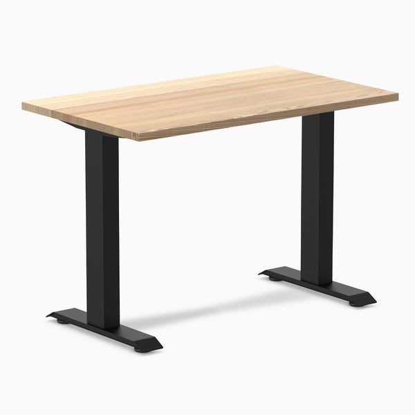 Desky Zero Mini hardwood desk with a light White Ash top and matte black steel frame.