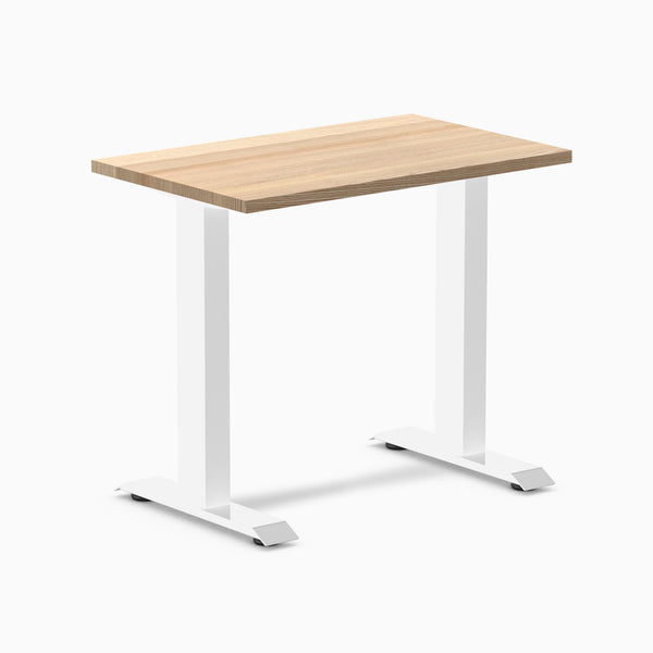 Desky Zero Mini hardwood desk with a light White Ash top and white steel frame.