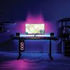 sit stand gaming desk in home office with leds 